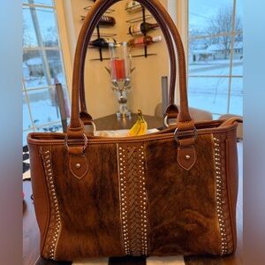 It’s XMAS 🎄Like new Conceal n Carry option for my gun toting mama’s! COWHIDE FUR